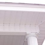 House Wash After pressure-washed white porch ceiling and column, showcasing a clean and bright finish